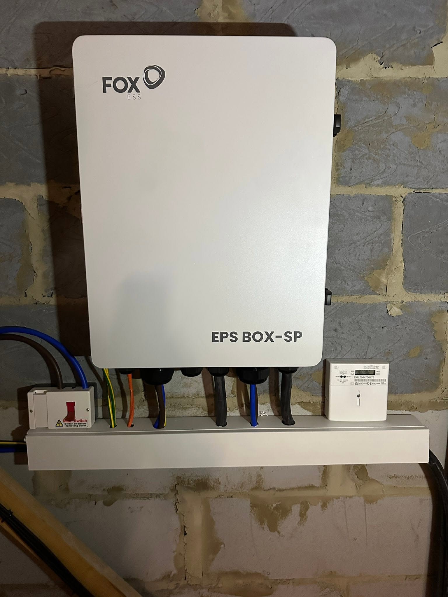 A Fox EPS backup gateway box fitted on a wall