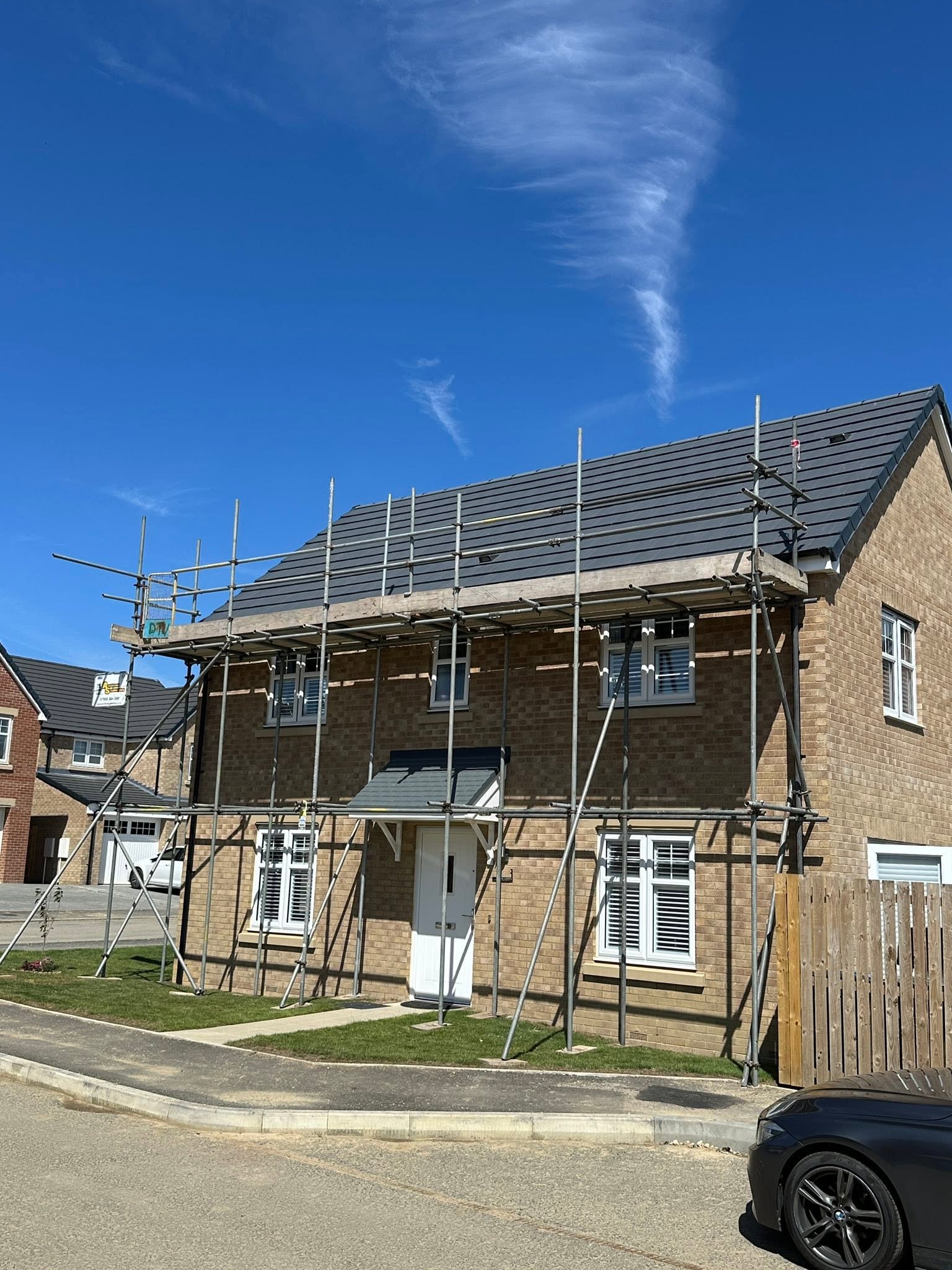 A new-build house under scaffolding ready for a solar installation